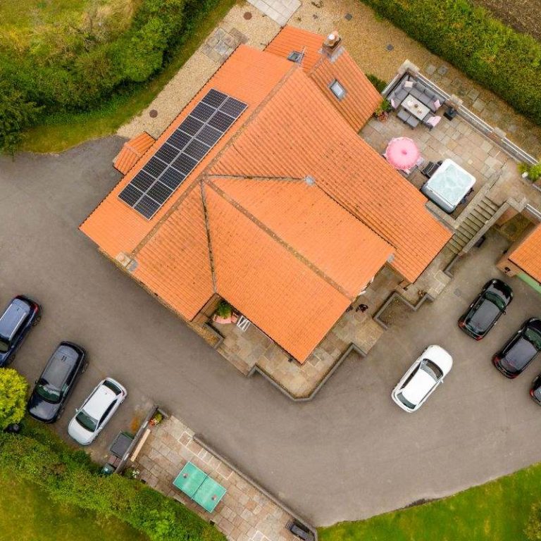 10 cars parked of the private drive